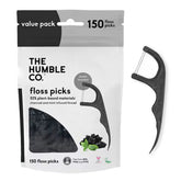 Packaging of The Humble Co. floss picks with a floss pick displayed on a white background.