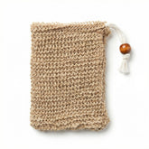 Natural hemp soap saver bag with open-weave mesh construction and wooden bead drawstring closure