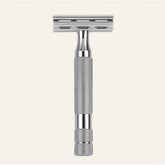 Rockwell 6C double-edge safety razor in white chrome finish displaying polished metal construction with textured grip handle