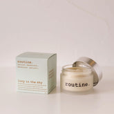 routine Lucy in the Sky natural deodorant jar with sage green packaging box showing 58g size and product description text about lavender patchouli vanilla scent