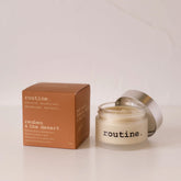 Routine Reuben & The Desert natural deodorant - glass jar with cream-coloured deodorant beside brown cardboard packaging showing sophisticated desert-inspired branding