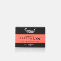 Rockwell Razors Barbershop Beard and Body Activated Charcoal Soap in black and coral packaging box displaying 170g 6oz size on white background