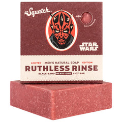 Dr. Squatch Ruthless Rinse limited edition men's bar soap in red paperboard packaging with crimson black-sand bar displayed at base