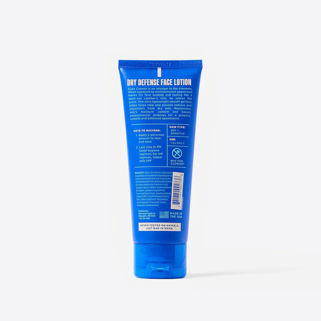 Back of the tube of Duke Cannon Dry Defense Face Lotion on a white background