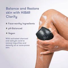 Person using a black bar of soap on their leg with text about HiBAR Clarify product.