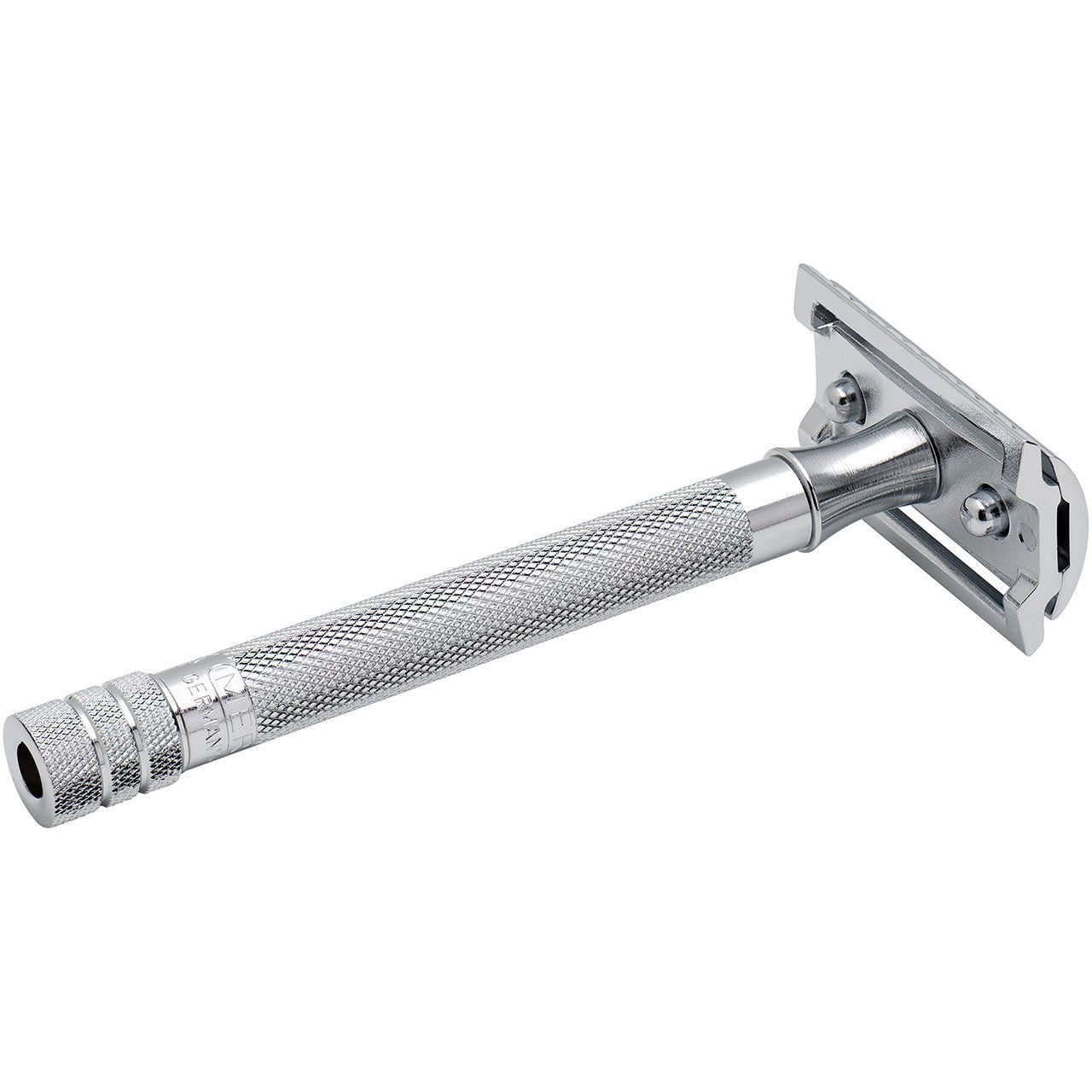 Merkur 23C three-piece safety razor disassembled view showing the chrome top cap, base plate with centre post, and long brass handle with knurled grip pattern demonstrating the simple short-screw assembly system