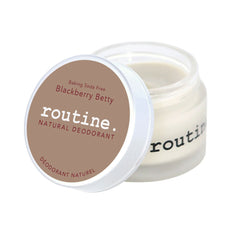 routine Blackberry Betty baking soda free deodorant jar opened showing brown label and cream texture - natural deodorant with blackberry raspberry scent visible in glass container - magnesium-based formula without baking soda