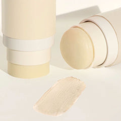 Close-up of Routine Cat Lady stick with product exposed and creamy texture swatch visible