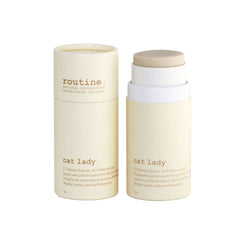 Two routine "cat lady" sticks on white background. One of them has a lid on, the other is with the deodorant sticking out.