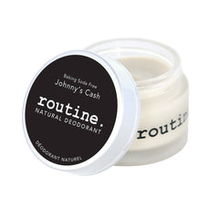Routine Johnny's Cash deodorant jar opened showing smooth cream texture - baking soda free magnesium formula for extra sensitive skin with woodsy masculine scent