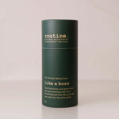routine. Like A Boss Deodorant Stick being displayed on a clean surface showing recyclable paperboard tube.