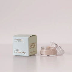 Routine Lucy in the Sky vegan mini deodorant - soft mint green cardboard box with opened glass jar showing cream-coloured deodorant - beeswax-free formula with lavender patchouli and vanilla aromatherapy blend