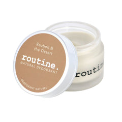 Routine Reuben & The Desert deodorant jar opened showing smooth cream texture - aluminum-free formula with palo santo and tobacco scent for sensitive skin protection