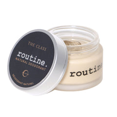 The Class natural deodorant open jar displaying cream texture with black lid - luxury scented formula showing smooth consistency for sensitive skin application