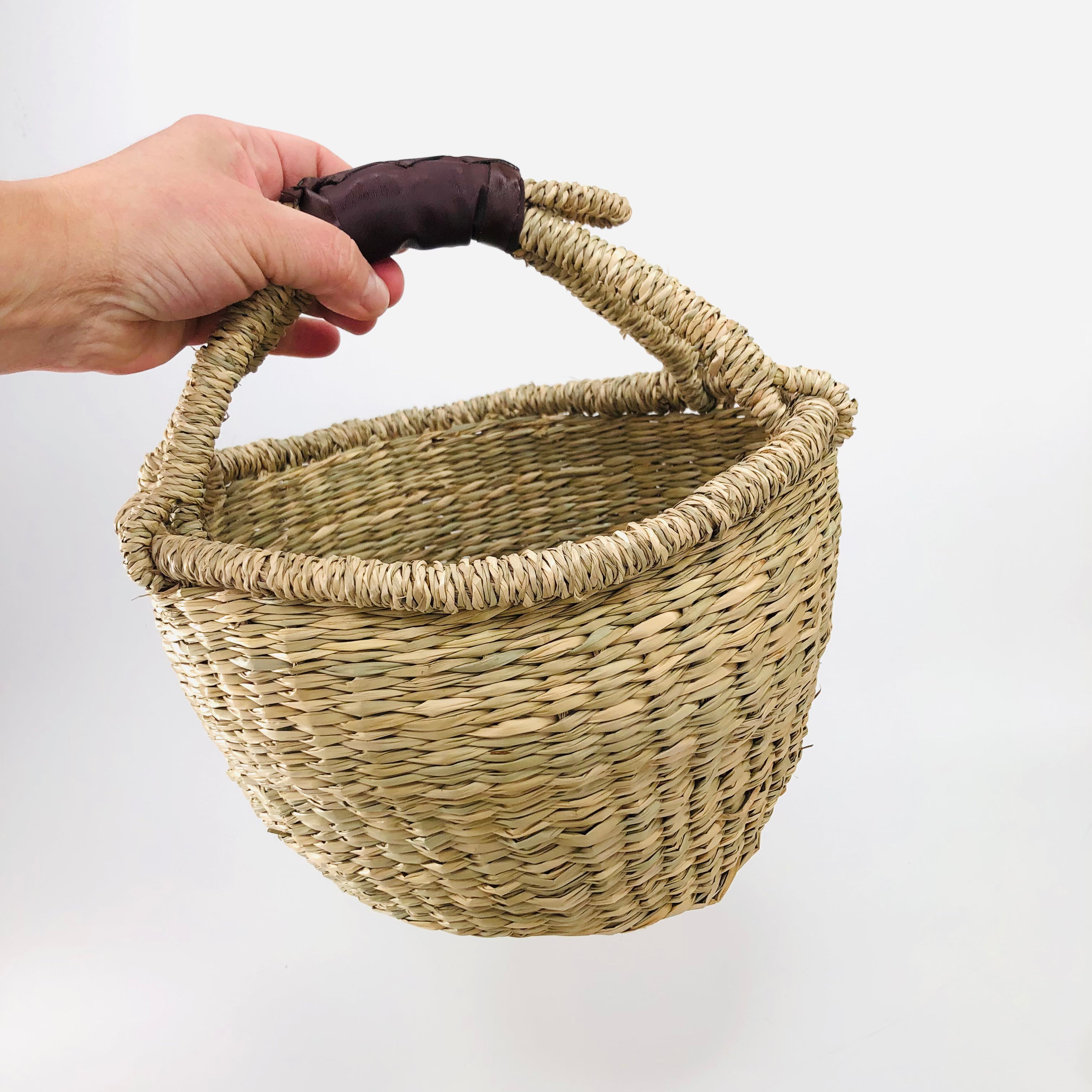 handwoven natural seagrass boho bolga basket